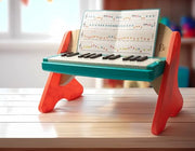 B. toys Wooden Piano, Mini Maestro with Color-Coded Songbook | Wooden piano toy with color-coded keys and songbook featuring 6 classical compositions; 3+ Years
